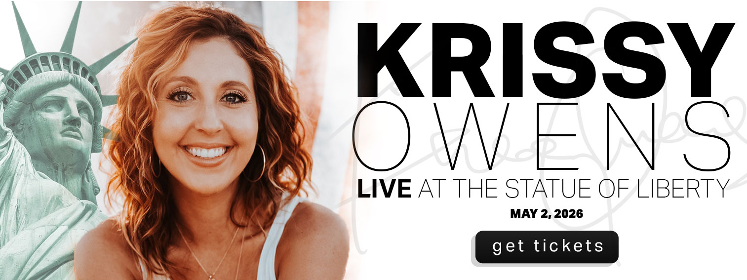 Krissy-Owens-Website-Hero-Image---Krissy-Owens-at-the-Statue-of-Liberty-May-2-2026-NEWEST